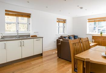 The open plan living area has all you need to relax together!