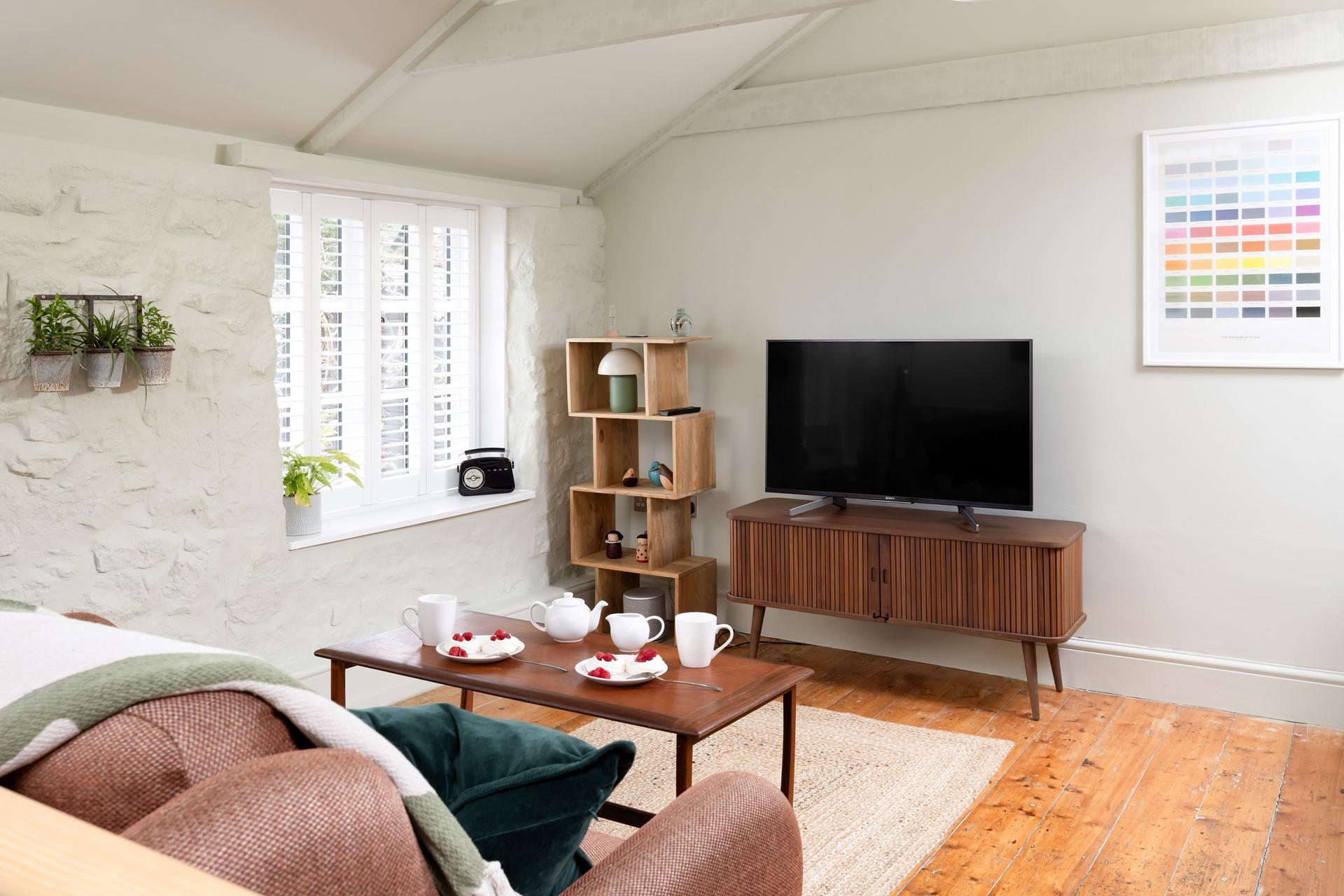 Relax together in the charming living area.