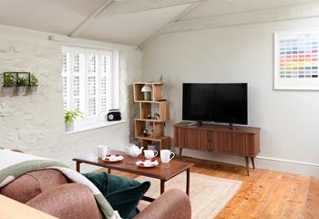Relax together in the charming living area.