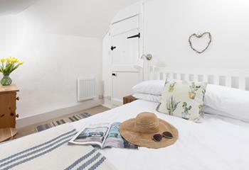 Drift off in the comfortable double bed after days of making memories. 