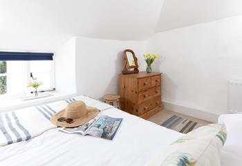 Flick through a magazine in bed and enjoy a lazy start to the day. 