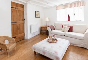 Sip a glass of wine and relax on the sumptuous sofa after a day of adventures. 