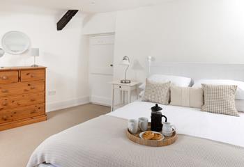 Bedroom 1 offers a peaceful night's sleep in the king-sized bed.