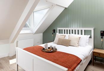 Bedroom 1 has a boutique feel.