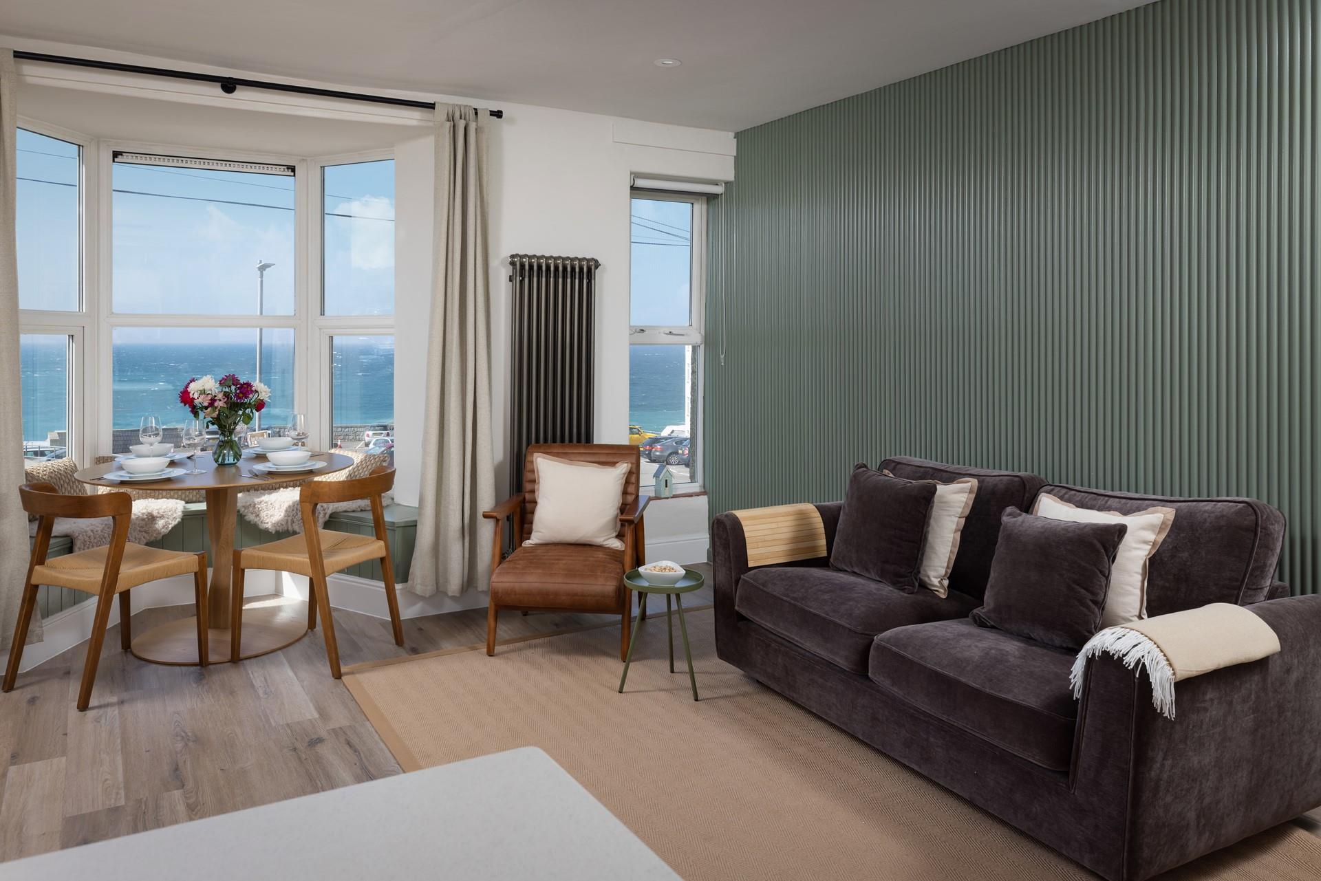 Open plan living makes the most of the seascape.