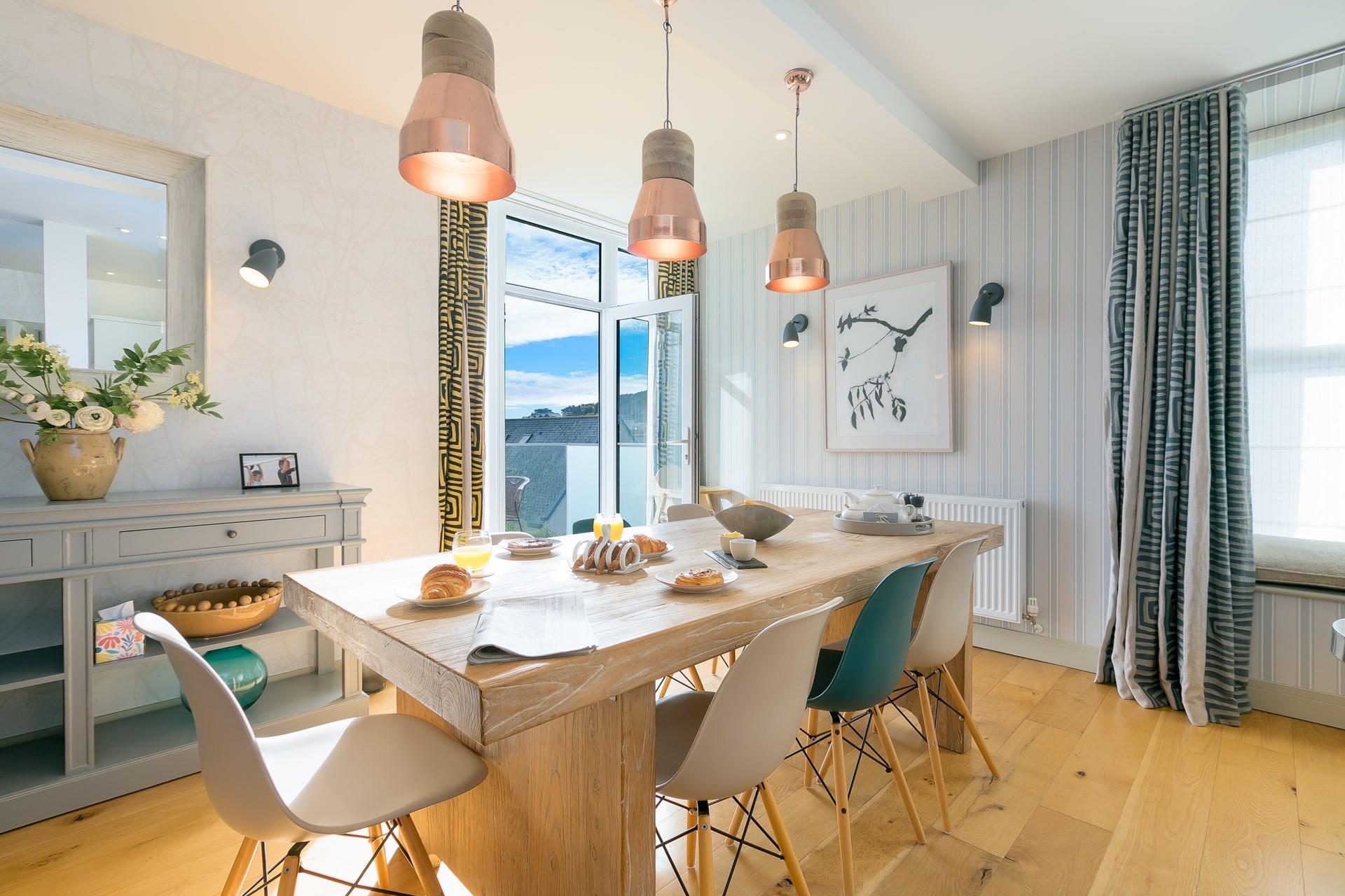 The contemporary dining table makes the perfect setting for family meals.
