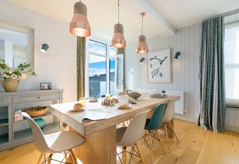 The contemporary dining table makes the perfect setting for family meals.