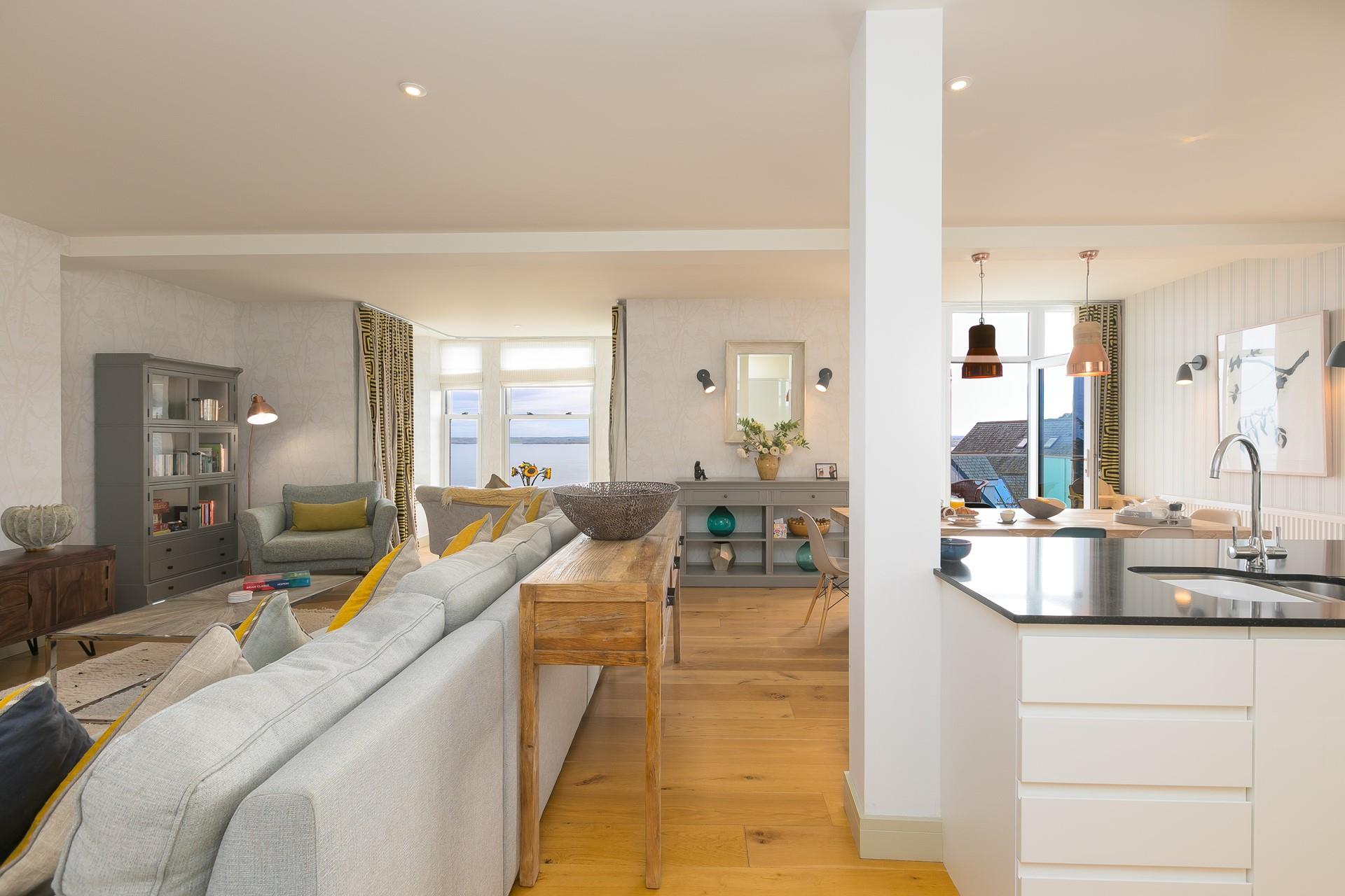 Open plan living makes the most of the far-reaching sea view.