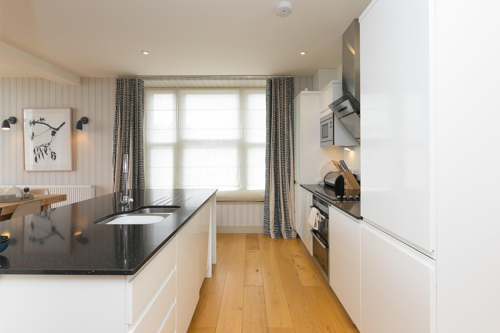The sleek kitchen has all the amenities you need!