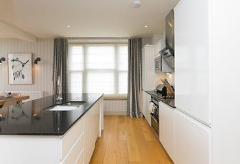The sleek kitchen has all the amenities you need!