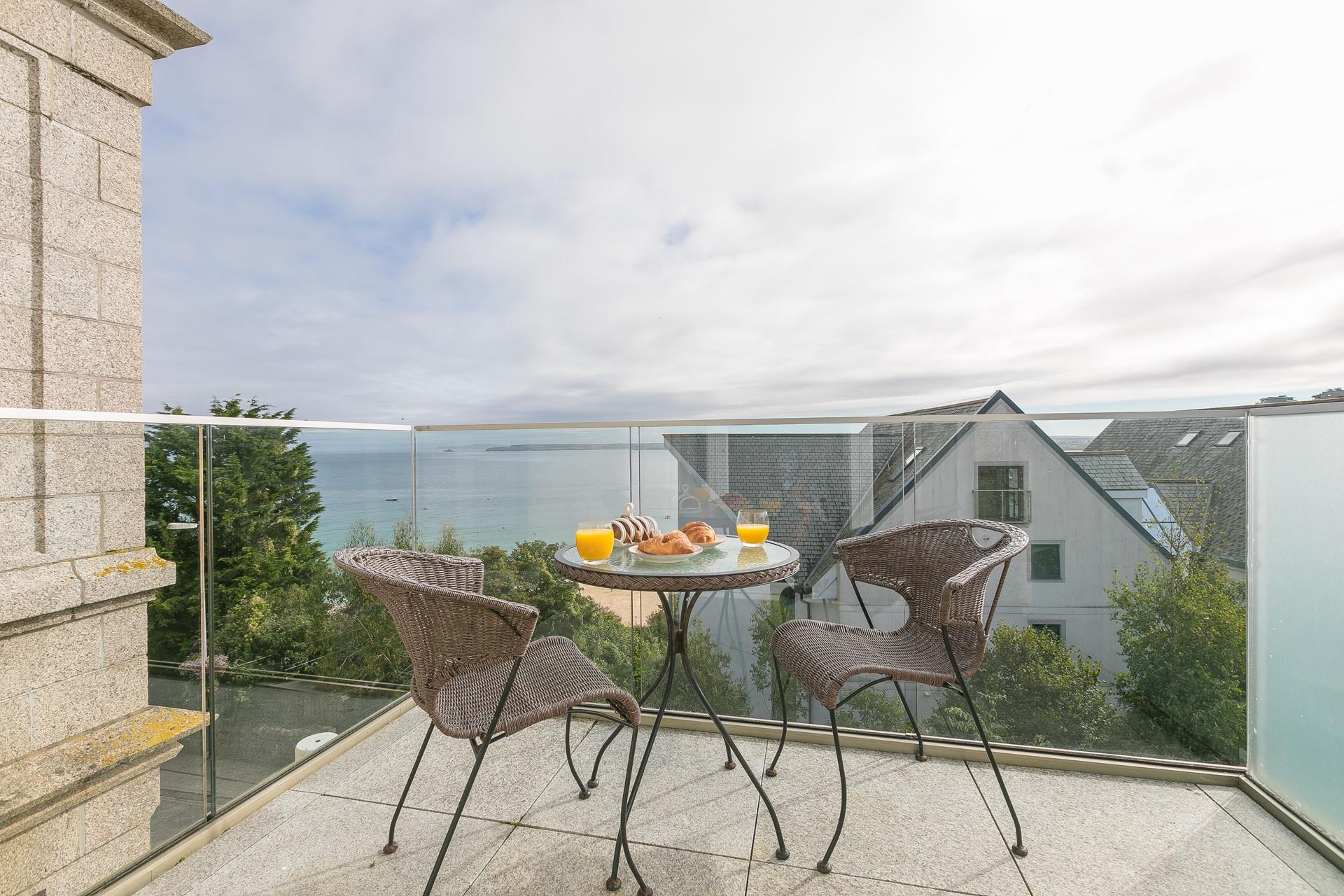 Enjoy mornings on the balcony, watching the tide ebb and flow.