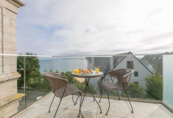 Enjoy mornings on the balcony, watching the tide ebb and flow.