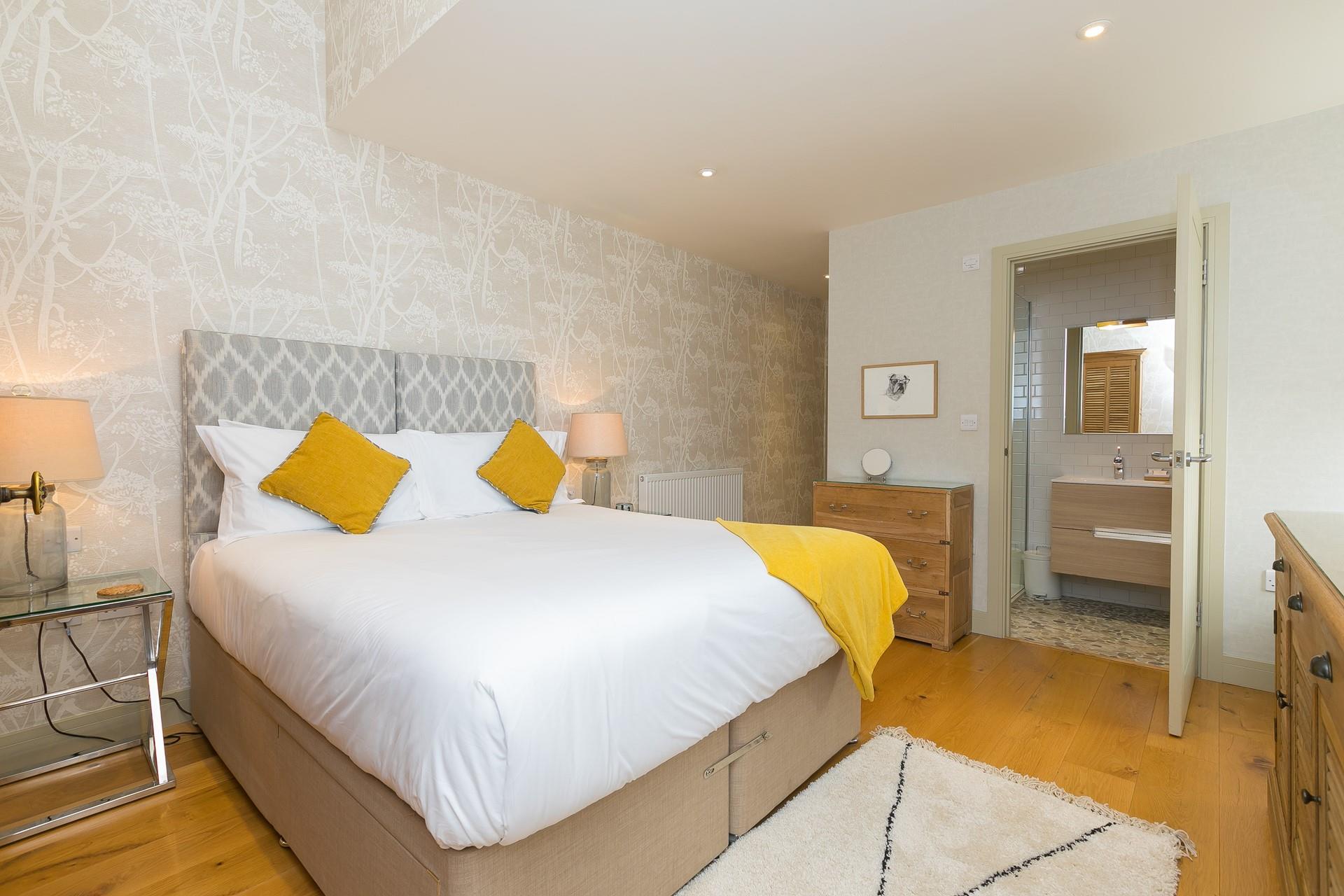 Sink into bed after days of exploring the town. 