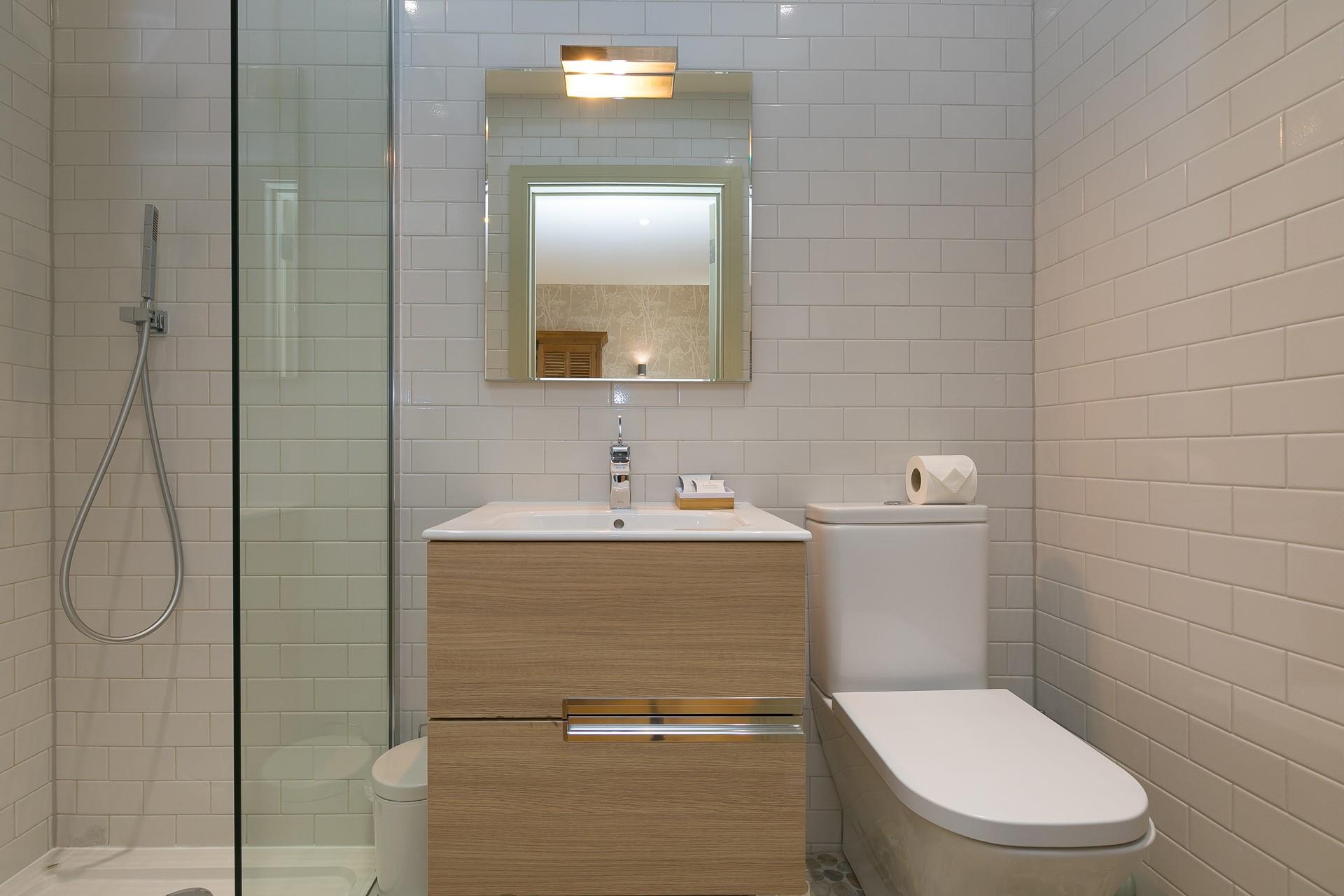 The en suite has a refreshing rainfall shower!