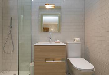 The en suite has a refreshing rainfall shower!