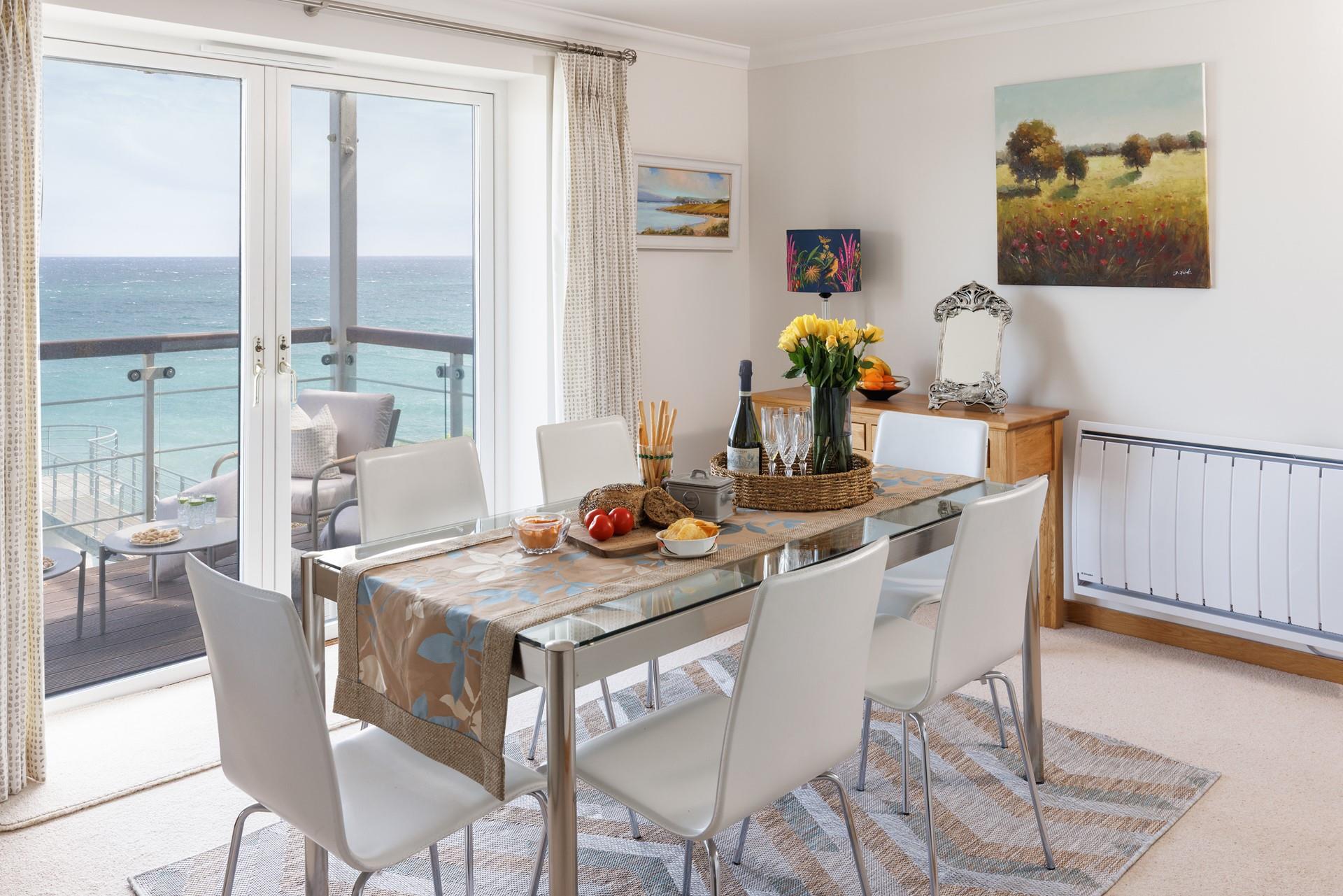 Open the balcony doors and let the sea breeze into the apartment.