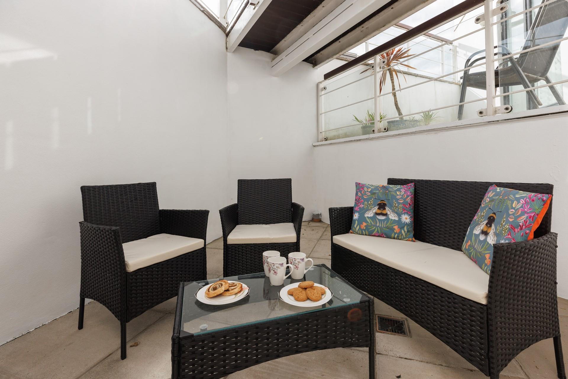 Enjoy a pastry in the fresh air to start the day.