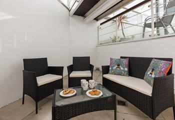Enjoy a pastry in the fresh air to start the day.