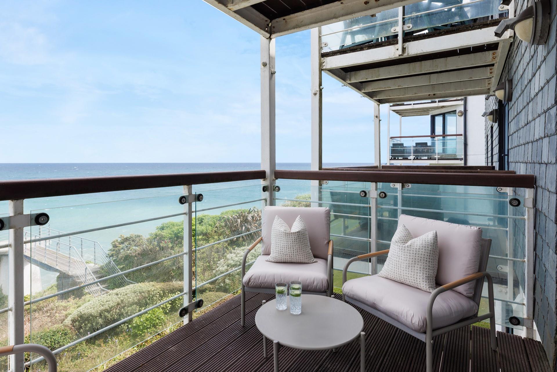 Enjoy drinks with a view on the balcony!