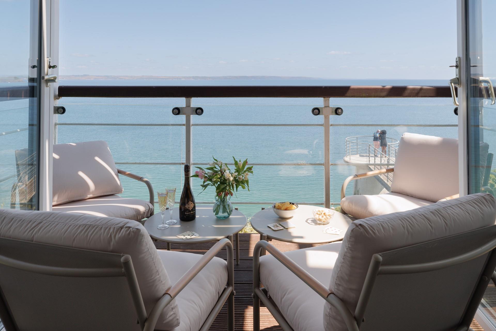 Unwind on the balcony watching the ever-changing tide.