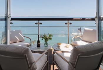 Unwind on the balcony watching the ever-changing tide.