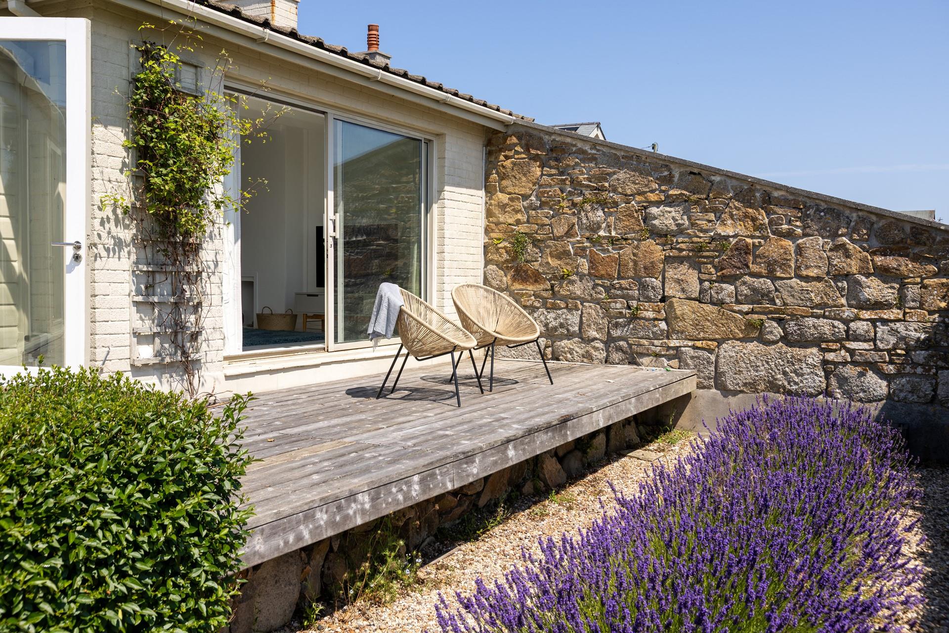 Traditional Cornish stone lines the stunning garden.