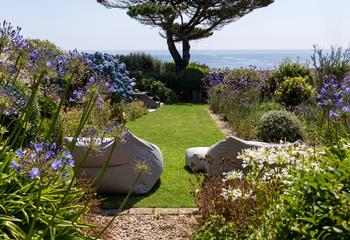 The milder than average climate creates a sub-tropical feel to the garden.