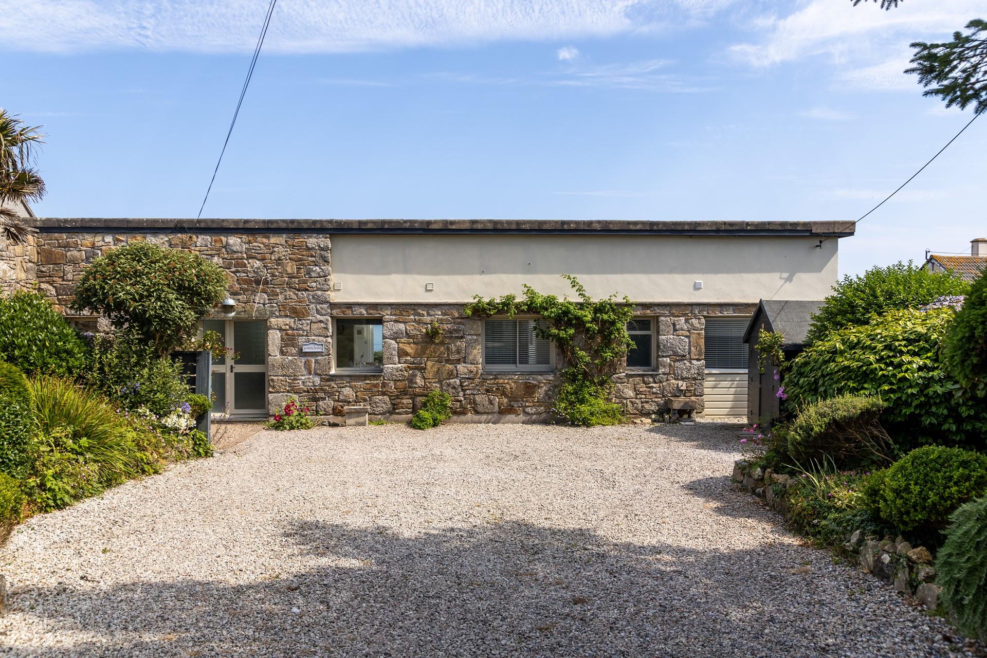 A warm welcome awaits, along with plenty of parking on the private driveway.