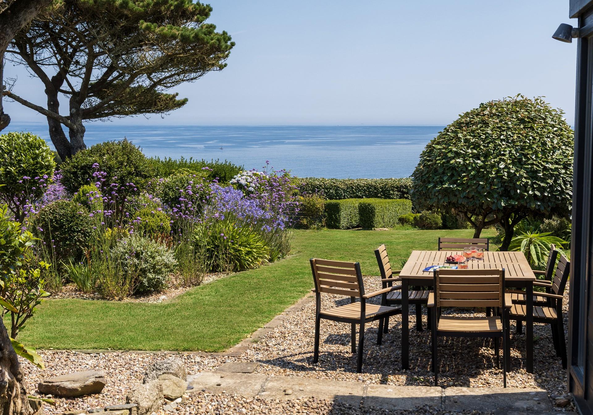 You'll find lots of delightful spots to enjoy the garden and the sea view.