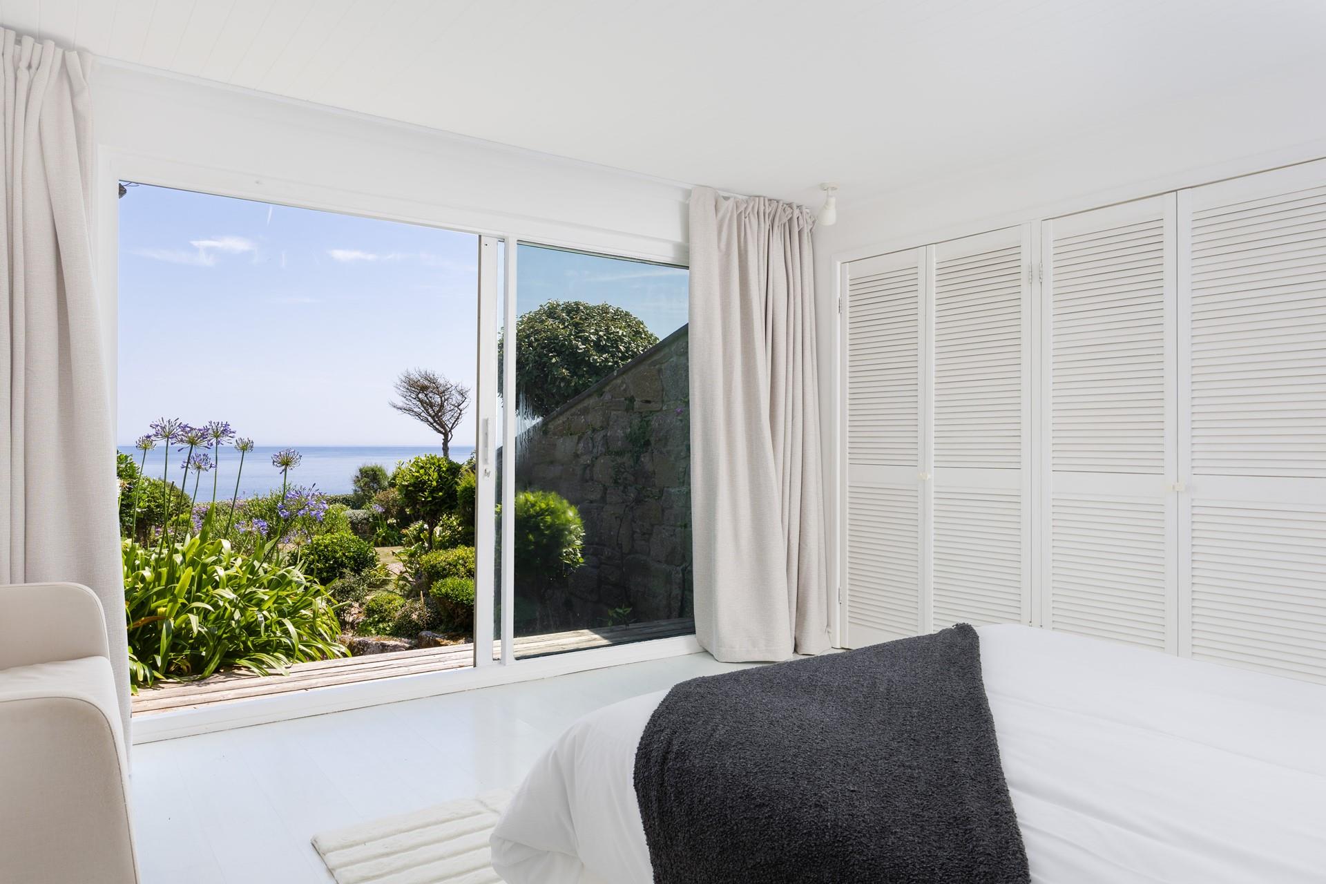 Bedroom 1 is a calming sanctuary with a sumptuous king size bed.