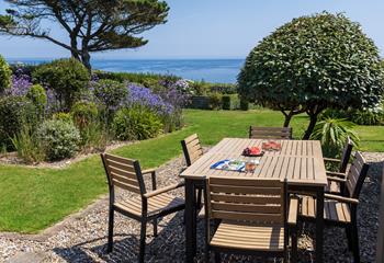 Sit back and admire all the colours of the garden, against the everchanging ocean blues.