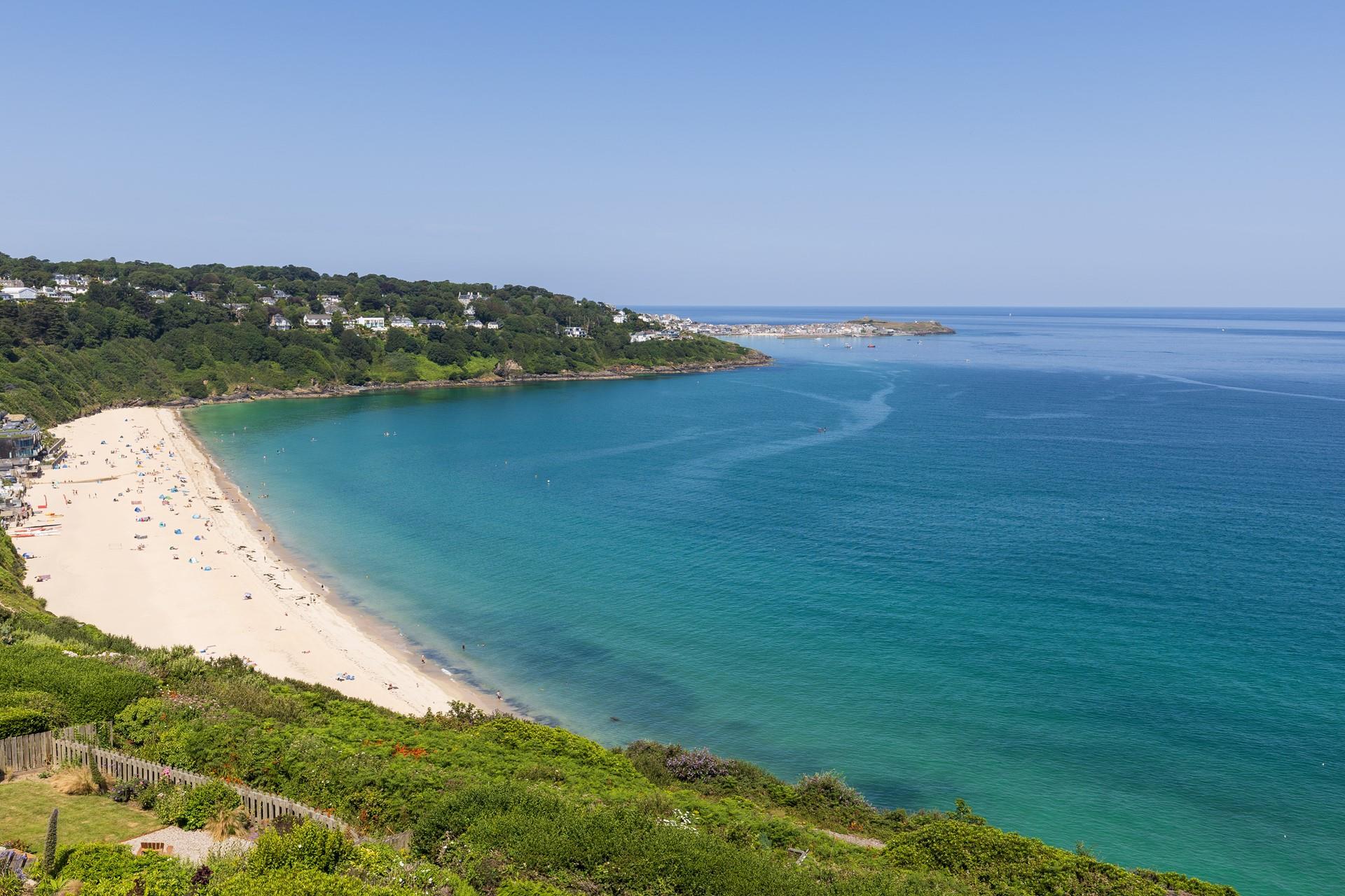 Backed by tropical flora, Carbis Bay is a tropical paradise!