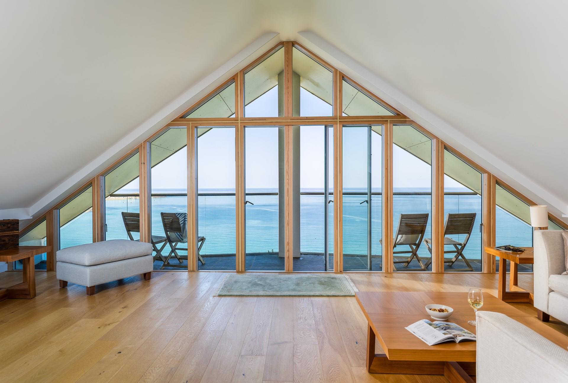 Spacious open plan living comes with an ocean backdrop!
