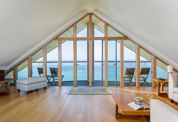 Spacious open plan living comes with an ocean backdrop!
