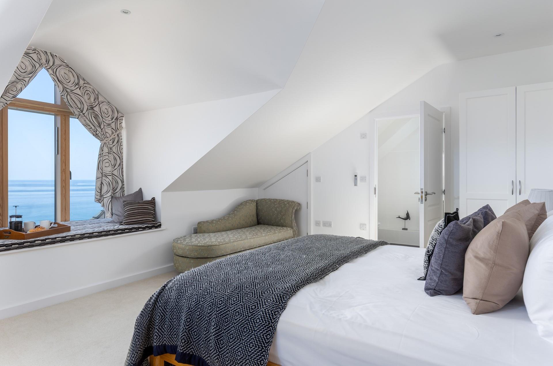 Listen to the sounds of the sea a you drift off in bedroom 2. 