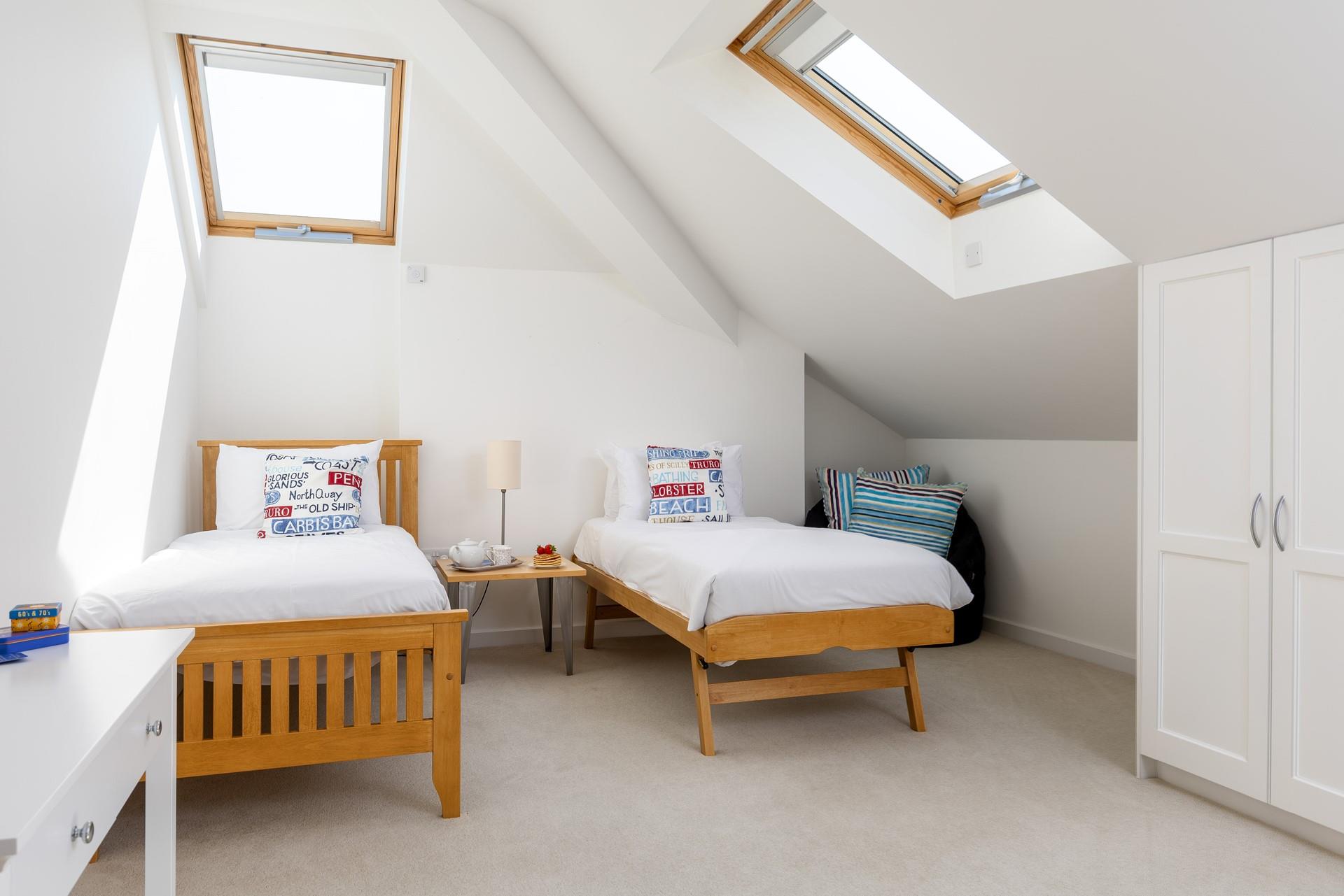 The twin bedroom offers flexible sleeping, for either adults of children.