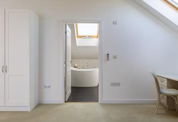 Bedroom 3 boasts an en suite with a luxurious slipper bath.