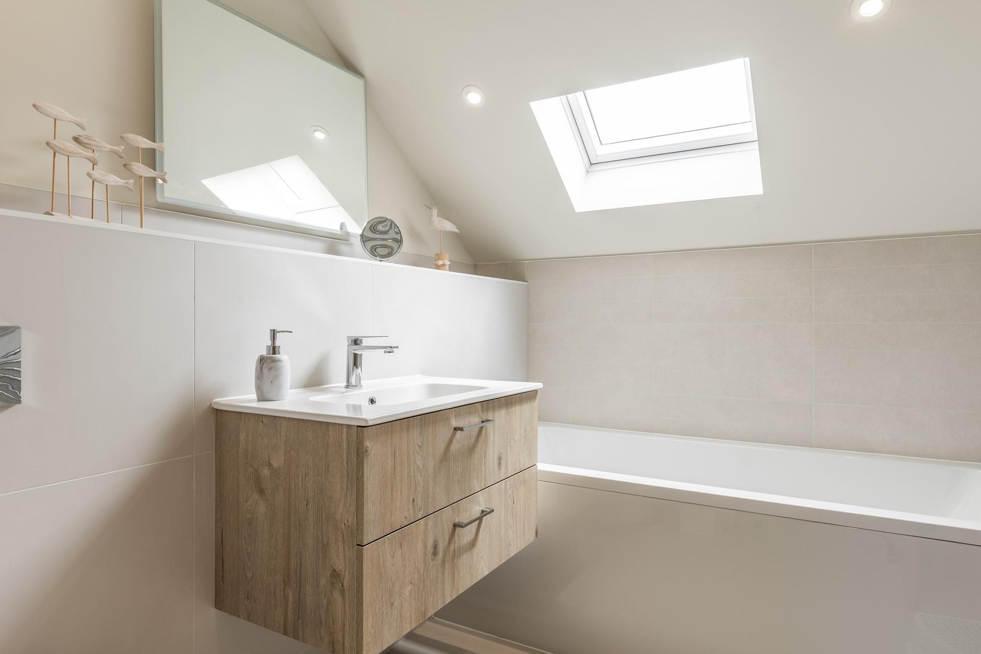 Relax in the bath after a hike along the nearby coast path!