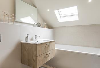 Relax in the bath after a hike along the nearby coast path!