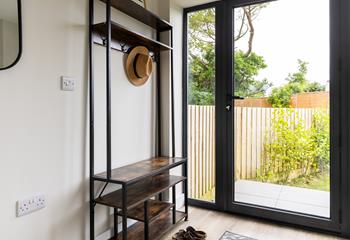 The welcoming entrance has plenty of storage.