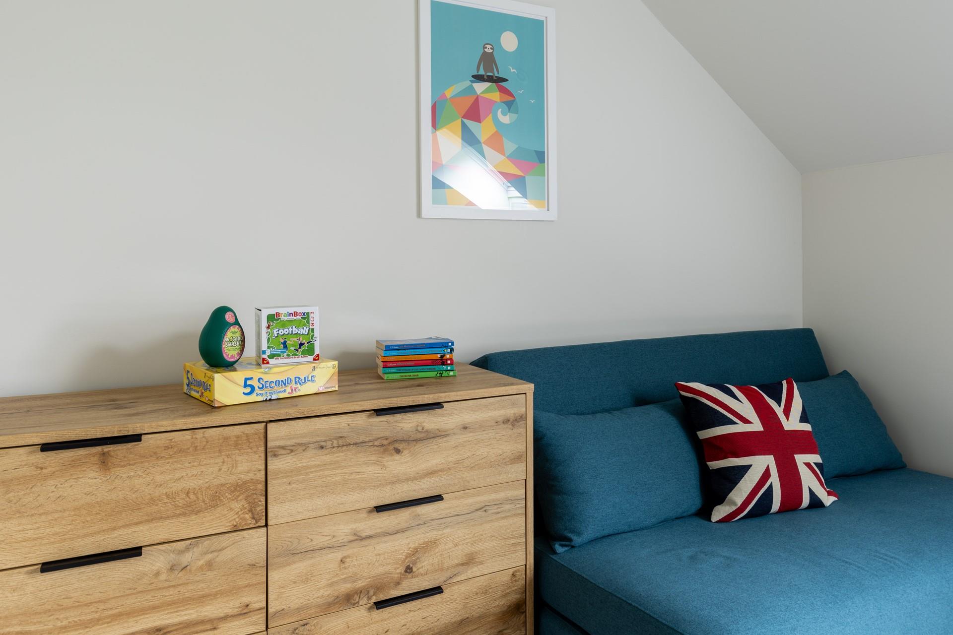 With a cosy sofa and plenty of storage.
