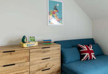With a cosy sofa and plenty of storage.