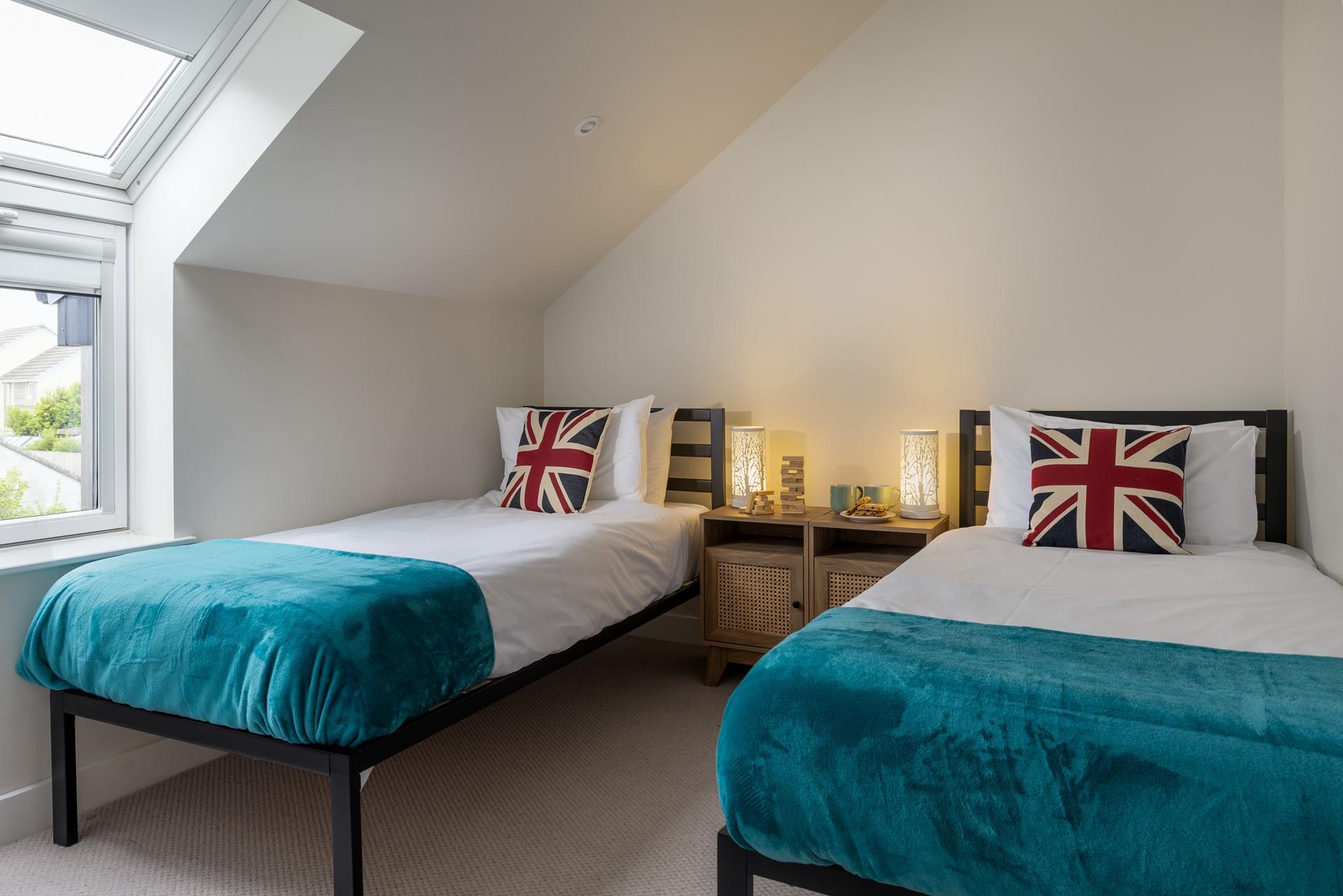 The twin beds are suitable for either adults or children.