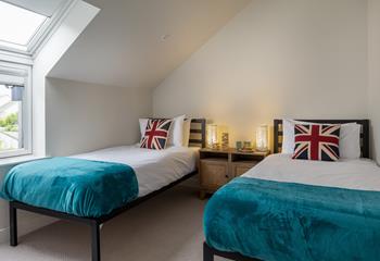 The twin beds are suitable for either adults or children.