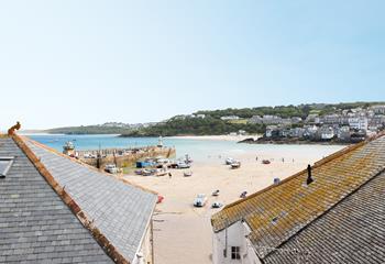 Gaze across the rooftops at the ever-changing tide.