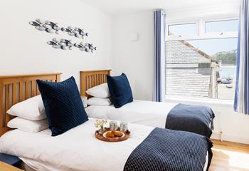 Wake up to harbour views and colourful fishing boats bobbing on the tide.