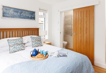 A handy en suite means you can get ready with ease in the morning.