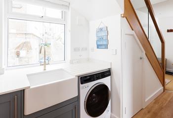 Wash off your holiday best in the handy utility area. 