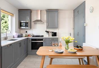 Spend time together cooking and dining in the modern kitchen.