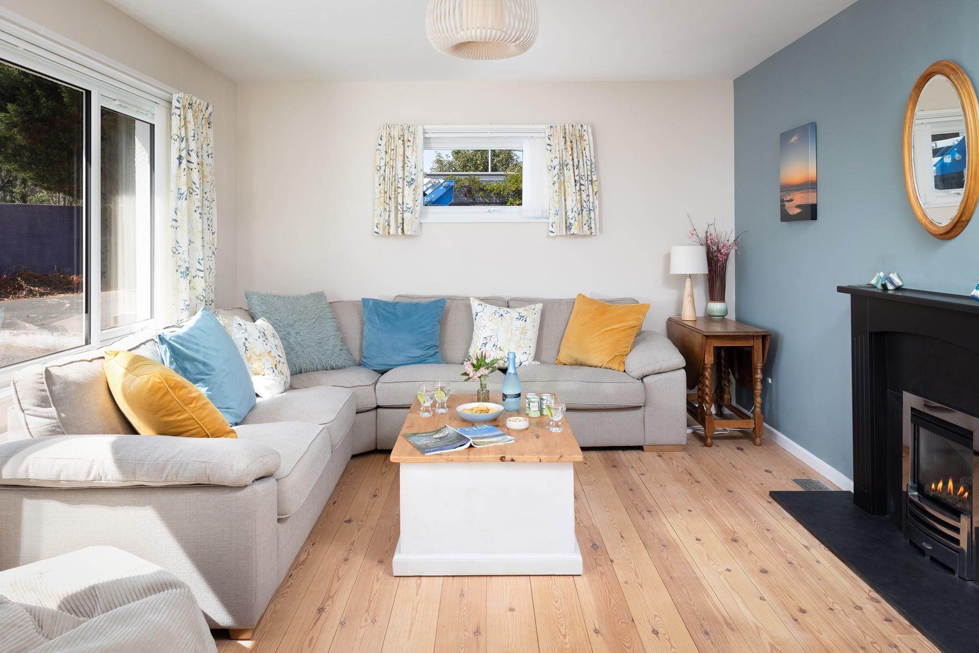 The sitting room is a light and bright space, bursting with colour.